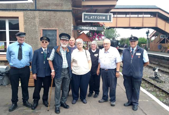 2023.08.17 After a long absence through illness Station Master John Parsons (centre) is welcomed by the 'Thursday Crew'. © Chris Hooper.