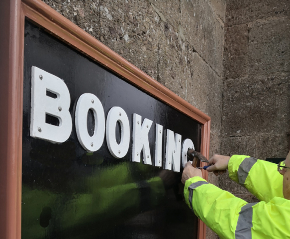 2024.03.12 Martin lettering a sign ready for the new year's opening. © (cc) Richard Salt.